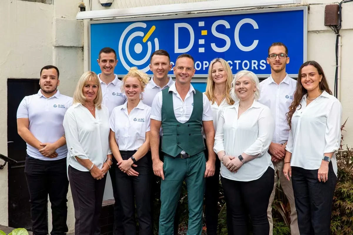 The DISC Chiropractors team outside the clinic on Claremont Road